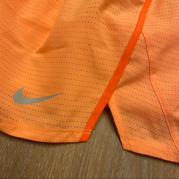 NIKE Women’s Standard Dri-FIT Mesh Running Shorts - Picture 4 of 13